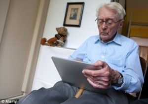 Older man using a tablet