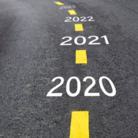 Years on the Road 2020, 2021, 2022, 2023 written on the road.