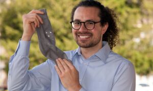 A smart sock, its grey and has sensors built in.