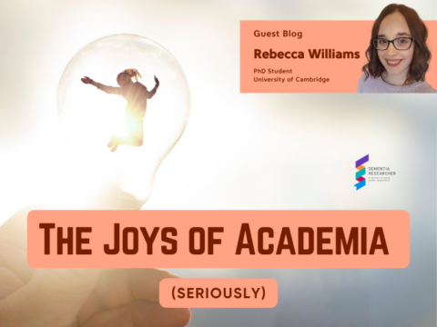 An image promoting a guest blog titled 'The Joys of Academia (Seriously)' by Rebecca Williams, a PhD student at the University of Cambridge. The top right corner shows a photo of Rebecca, a woman with long, wavy brown hair and glasses, smiling against a light background. The main image shows a person jumping inside a glowing lightbulb, representing creativity and energy, with a hand holding the lightbulb below. The Dementia Researcher logo is displayed in the bottom right corner.